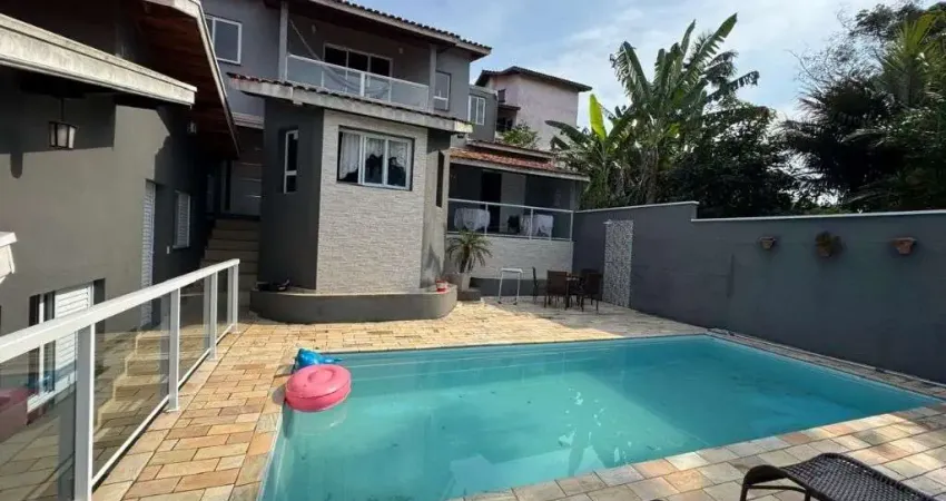 Casa com 5 dormitórios para alugar, 520 m² por R$ 5.500,00/mês - Massaguaçu - Caraguatatuba/SP