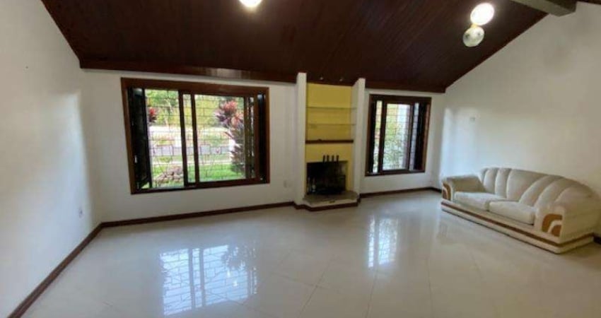 Casa comercial com 3 salas para alugar na Avenida Celestino Bertolucci, 485, Hípica, Porto Alegre