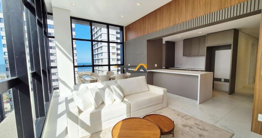 Apartamento 02 suítes com pé direito duplo e vista para o mar