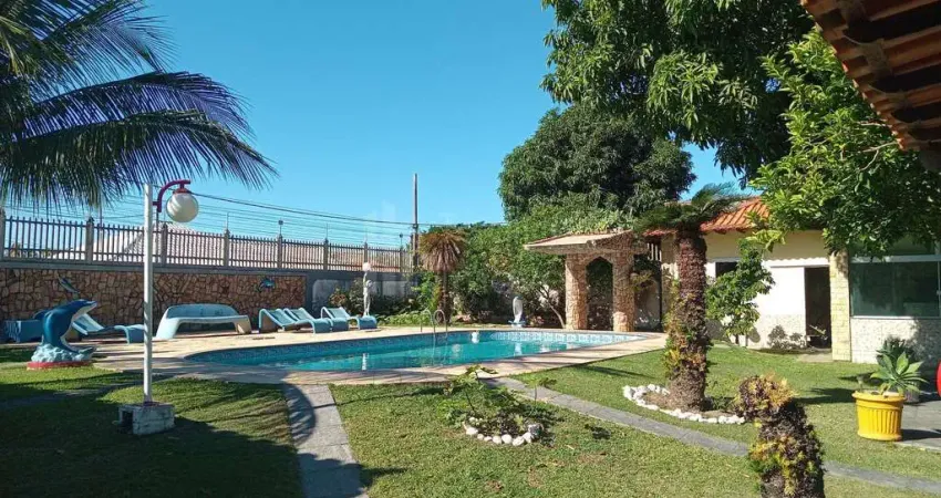 Casa quatro quartos sendo duas suítes 200 metros da lagoa