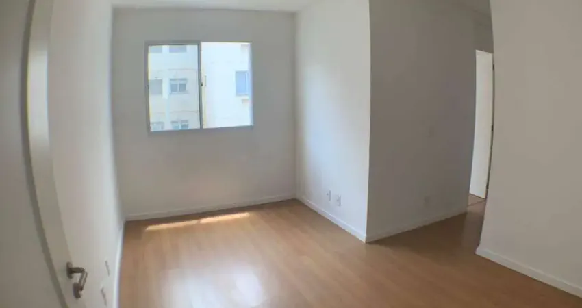 Apartamento novo, fica no 4º andar. Dois quartos, sala, cozinha, banheiro, área de serviço e 1 vaga de garagem.