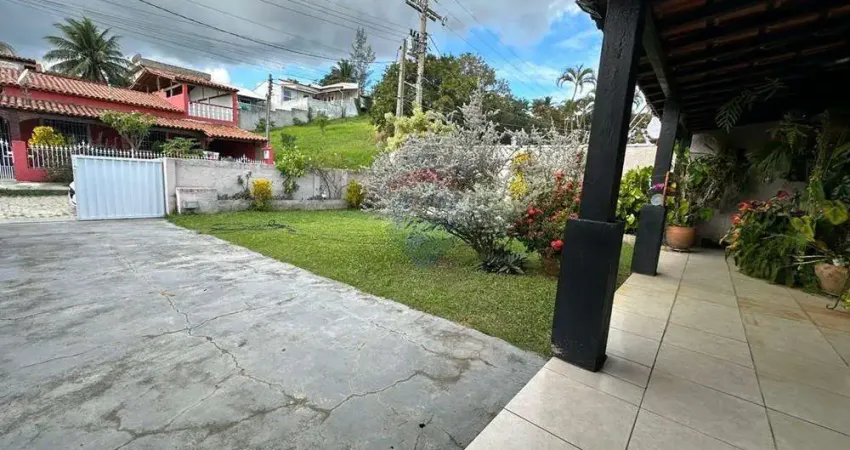 Casa com tres quartos uma suite piscina churrasqueira e vaga de garagem