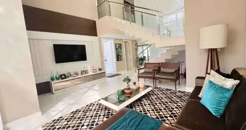 Casa de alto padrão em condomínio fechado com 5 suítes e 4 vagas de garagem em Itajaí