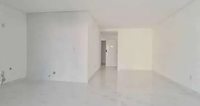 Apartamento com 3 suítes e 2 vagas de garagem na Praia central em Itapema