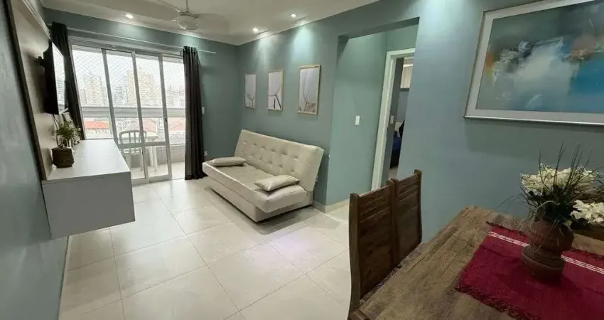 Apartamento decorado com 1 dormitório e living ampliado no Boqueirão – PG/SP