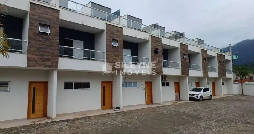 Casa em condomínio fechado com 3 quartos para alugar no Massaguaçu, Caraguatatuba 