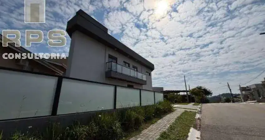 Casa à venda no Condomínio Terras de Atibaia, 3 suítes, conceito aberto, área gourmet integrada, fechadura eletrônica, varanda, aceita financiamento.