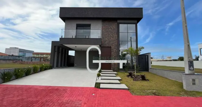 Casa com 4 dormitórios à venda, 262 m² por r$ 2.000.000,00 - condomínio flora rica - peruíbe/sp