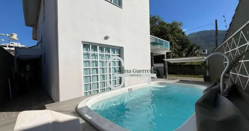 Casa com 3 dormitórios à venda, 167 m² por r$ 590.000,00 - centro - peruíbe/sp