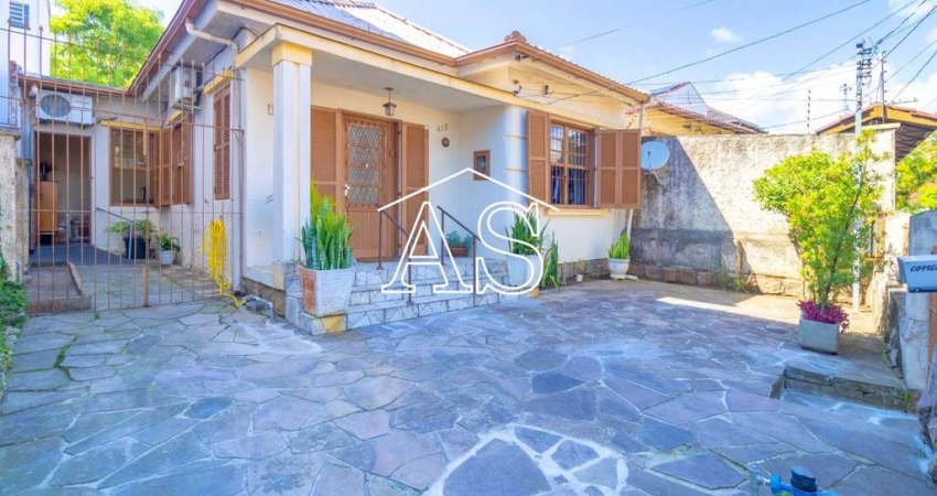 Casa com 3 quartos à venda na Rua Paissandu, 412, Partenon, Porto Alegre