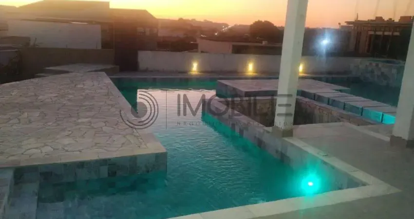 Elegante casa térrea 598m² com 3 suítes, piscina e área gourmet no condomínio terras de mont serrat em salto sp