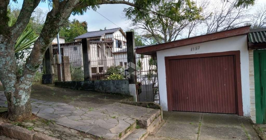 Casa com 3 quartos à venda na Rua Erechim, 1157, Nonoai, Porto Alegre