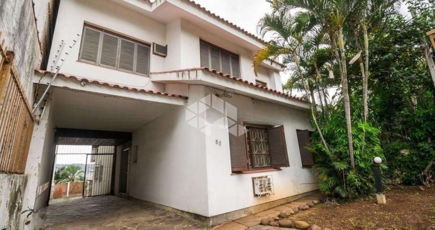 Casa com 5 quartos à venda na Rua Palestina, 53, Bom Jesus, Porto Alegre