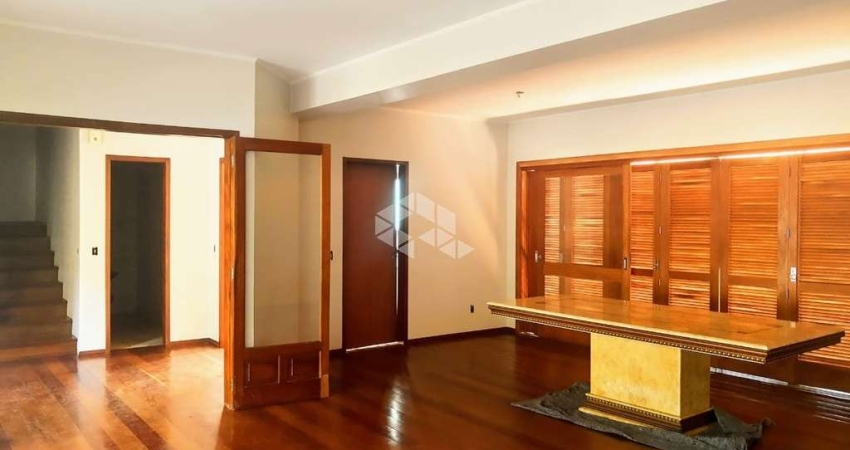 Casa com 4 quartos à venda na Rua Alcebíades Antônio dos Santos, 169, Nonoai, Porto Alegre