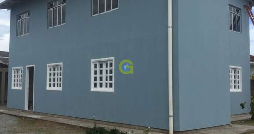 Casa comercial a venda bairro Ponte do Imaruim, em Palhoça, conta com 4 apartame