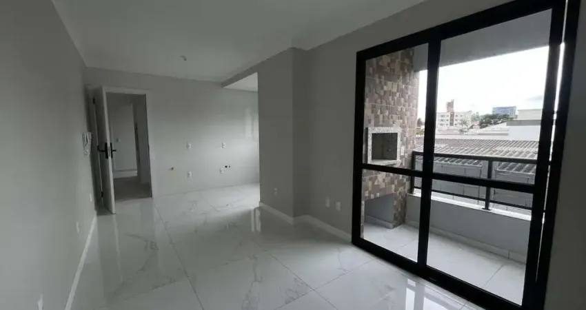 Apartamento novo de dois dormitórios com duas sacadas -Flor de Nápolis São José