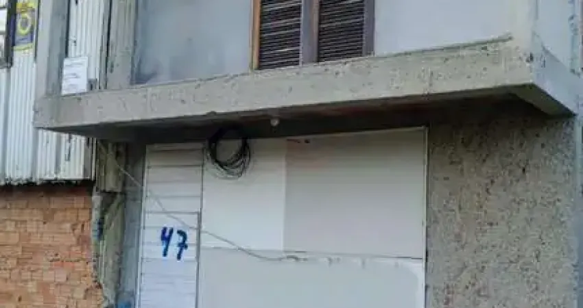 Casa-sobrado em construção, já tendo parte terminada, bairro laranjinha