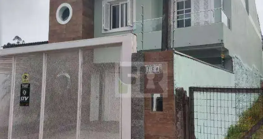 Ótimo sobrado com 3 dormitórios sendo 2 suítes á venda no bairro Moradas do Bosque em Cachoeirinha RS.