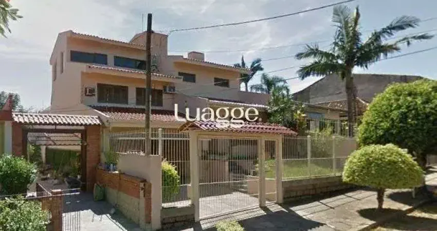 Casa com 3 quartos à venda na Rua Professor Henrique Desjardins, 364, Espírito Santo, Porto Alegre
