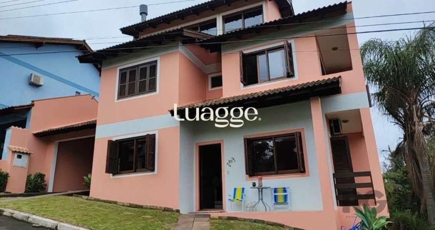 Casa em condomínio fechado com 4 quartos à venda na Avenida Vicente Monteggia, 2088, Cavalhada, Porto Alegre