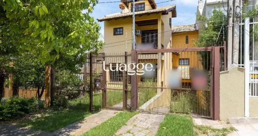 Casa com 3 quartos à venda na Rua Josué Guimarães, 256, Espírito Santo, Porto Alegre