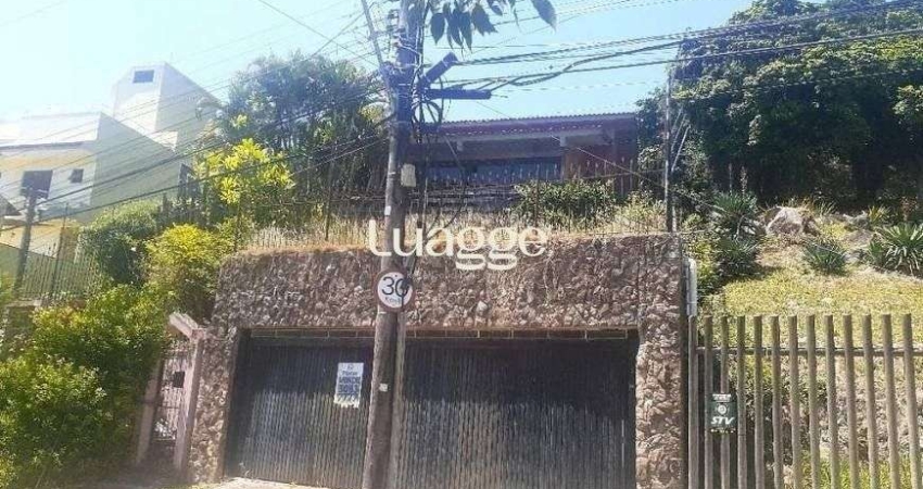 Casa com 5 quartos à venda na Rua Alcebíades Antônio dos Santos, 359, Nonoai, Porto Alegre
