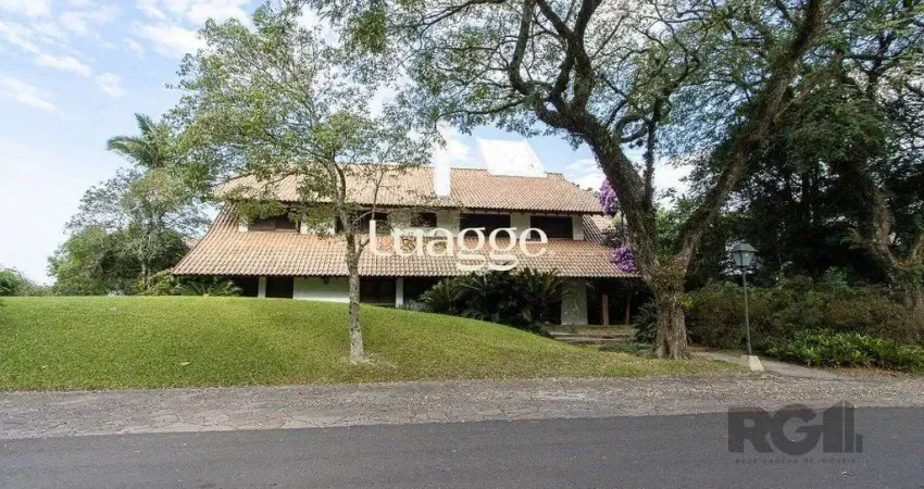 Casa em condomínio fechado com 6 quartos à venda na Avenida da Cavalhada, 5205, Cavalhada, Porto Alegre