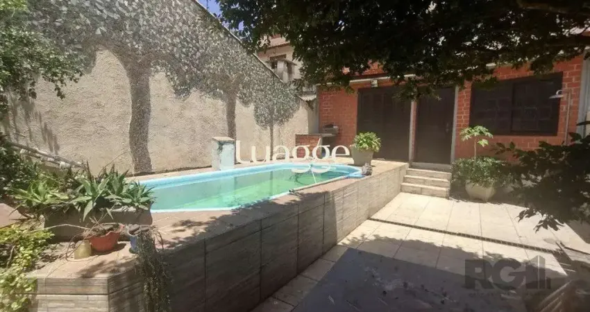 Casa com 4 quartos à venda na Rua Laguna, 264, Cavalhada, Porto Alegre