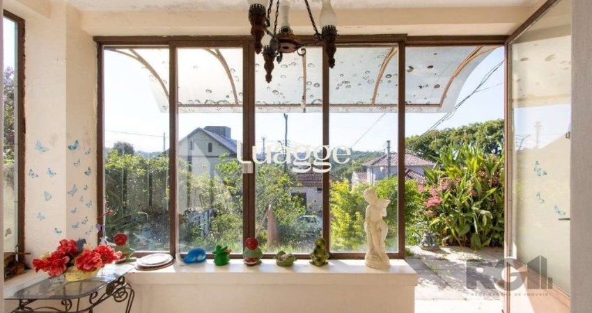 Casa com 2 quartos à venda na Rua Oscar Tollens, 300, Santa Tereza, Porto Alegre