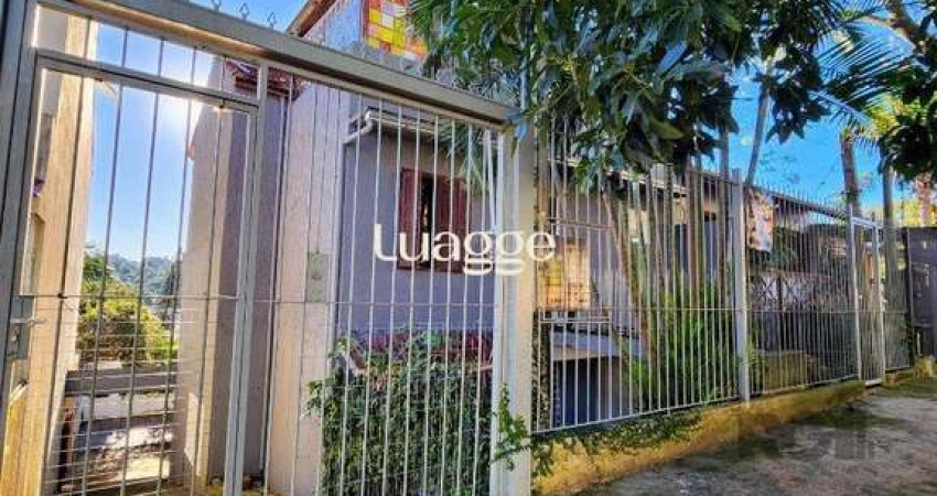 Casa com 4 quartos à venda na Rua Oscar Tollens, 157, Santa Tereza, Porto Alegre