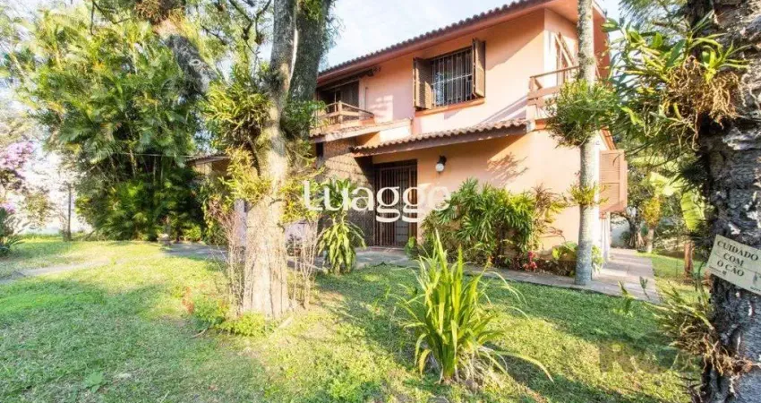 Casa com 4 quartos à venda na Rua Itapitocaí, 794, Cristal, Porto Alegre