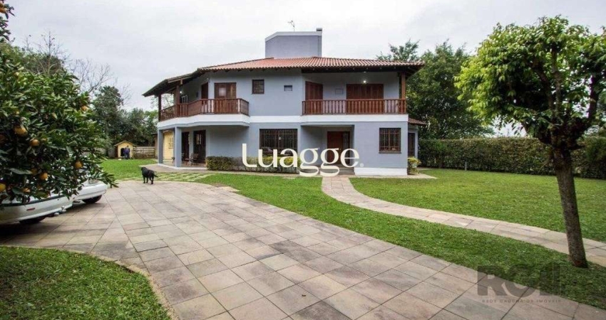Sobrado com 6 suites, lareira, lavabo, pátio - Bairro Belém Velho