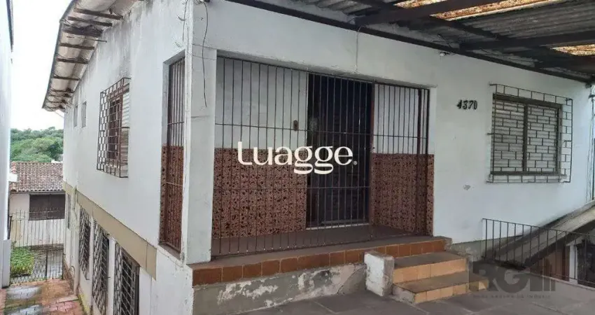 Casa com 3 quartos à venda na Avenida da Cavalhada, 4421, Cavalhada, Porto Alegre