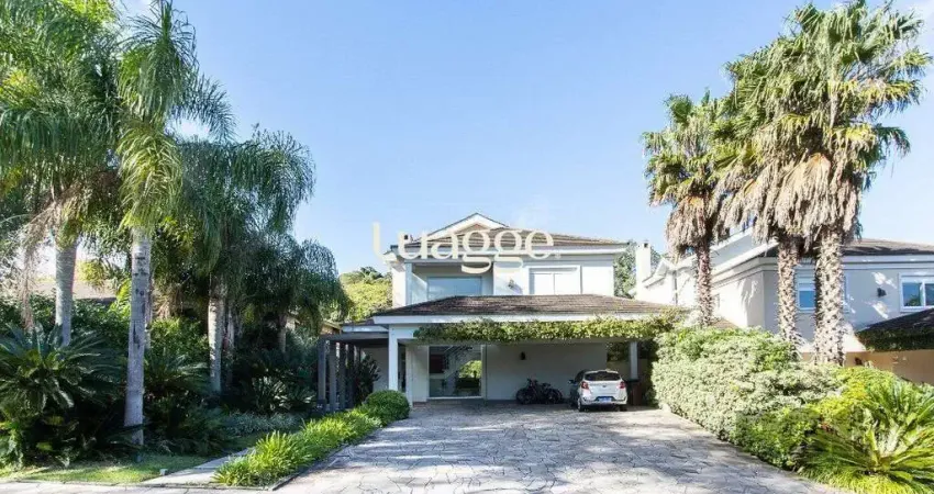 Casa no Condomínio Las Rocas, vista para o Guaíba, com 5 suítes