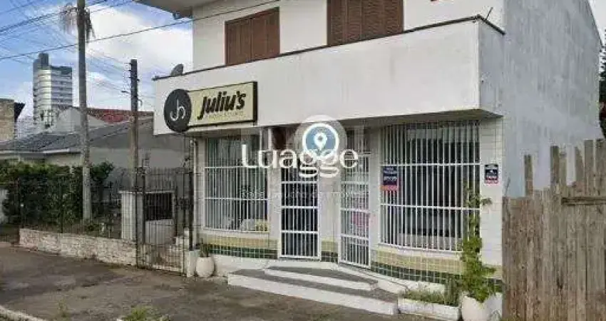 Apartamento de frente com 1 dormitório, sala, cozinha e sacada.