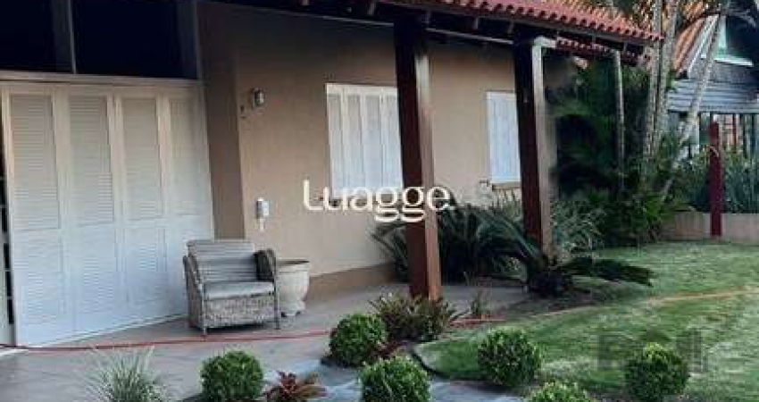 Casa com 5 quartos à venda na Rua Tipuana, 304, Atlântida, Xangri-Lá