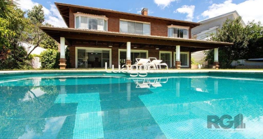 Casa em condomínio fechado com 4 quartos à venda na Avenida Juca Batista, 8078, Chapéu do Sol, Porto Alegre