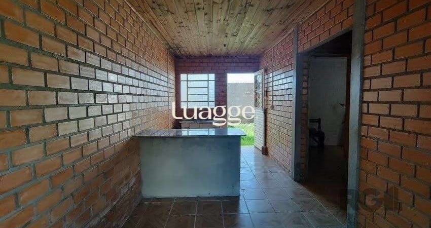 Casa com 2 quartos à venda na Rua Tenente Isolino Segobia, 102, Vila Nova, Porto Alegre