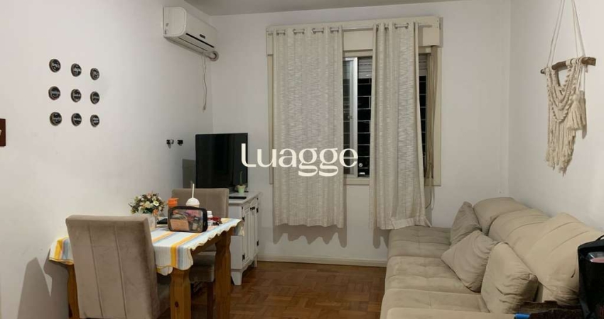 Apartamento de 2 dormitórios, living, cozinha, área de serviço e banheiro social.