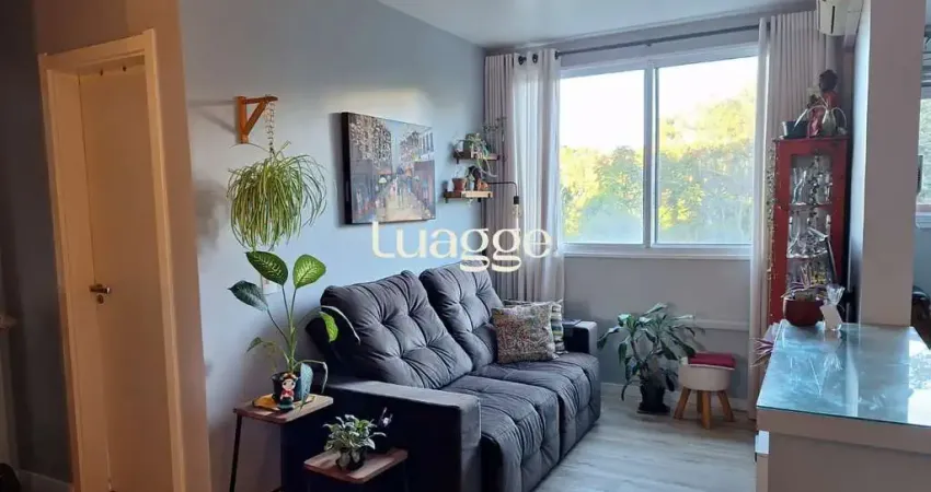 Apartamento de 2 quartos, cozinha planejada e 1 vaga escriturada.