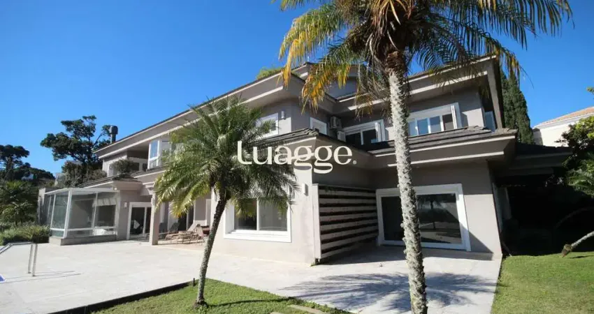 Casa alto padrão em condomínio fechado - 4 suítes, vista panorâmica