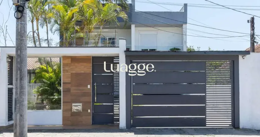 Excelente casa de 3 dormitórios, 3 suítes e 2 vagas no bairro cavalhada.