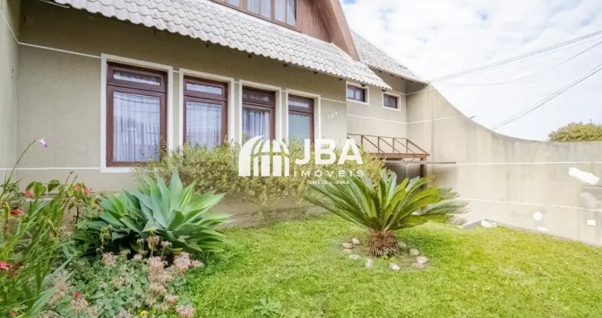 Casa ampla com espaço de jardim e estacionamento no bairro xaxim