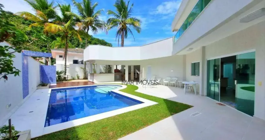 Linda casa com 5 suítes em condomínio fechado de alto padrão na praia de Pernambuco no Guarujá!