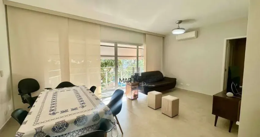 Apartamento reformado à venda na praia da enseada/mar imóveis prime.
