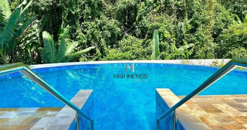 Apartamento em excelente localização, prédio novo a 100 metros da praia das astúrias/mar imóveis prime.