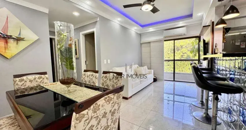 Apartamento com 3 dormitórios à venda, 85 m² por R$ 650.000,00 - Pitangueiras - Guarujá/SP