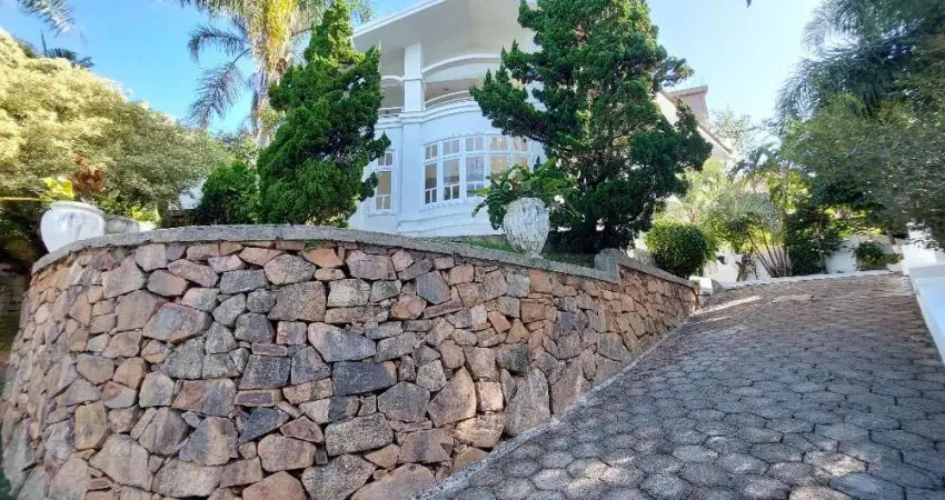 Casa em condomínio fechado com 4 quartos para alugar na Rua das Laranjeiras, 1122, Roçado, São José