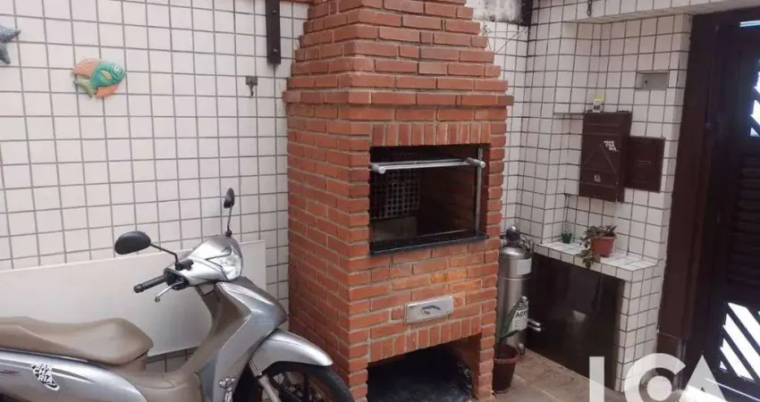 Casa com 2 dormitórios à venda por R$ 585.000 - Macuco - Santos/SP