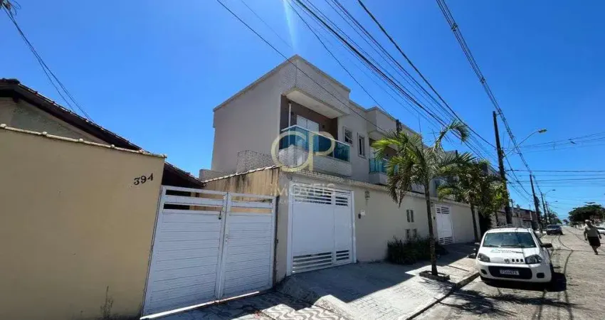 Casa geminada a 350 metros da praia no bairro maracanã em praia grande.